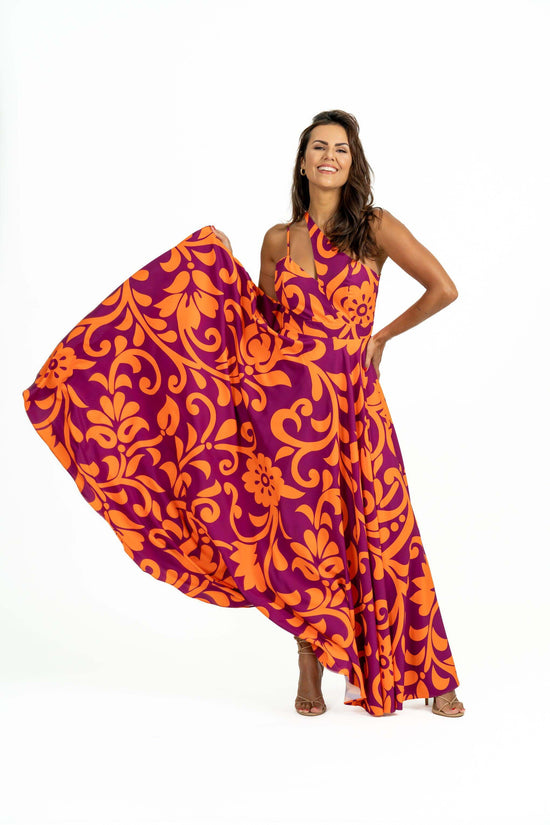 Myola Maxi Dress with asymmetrical front neckline in orange and magenta print