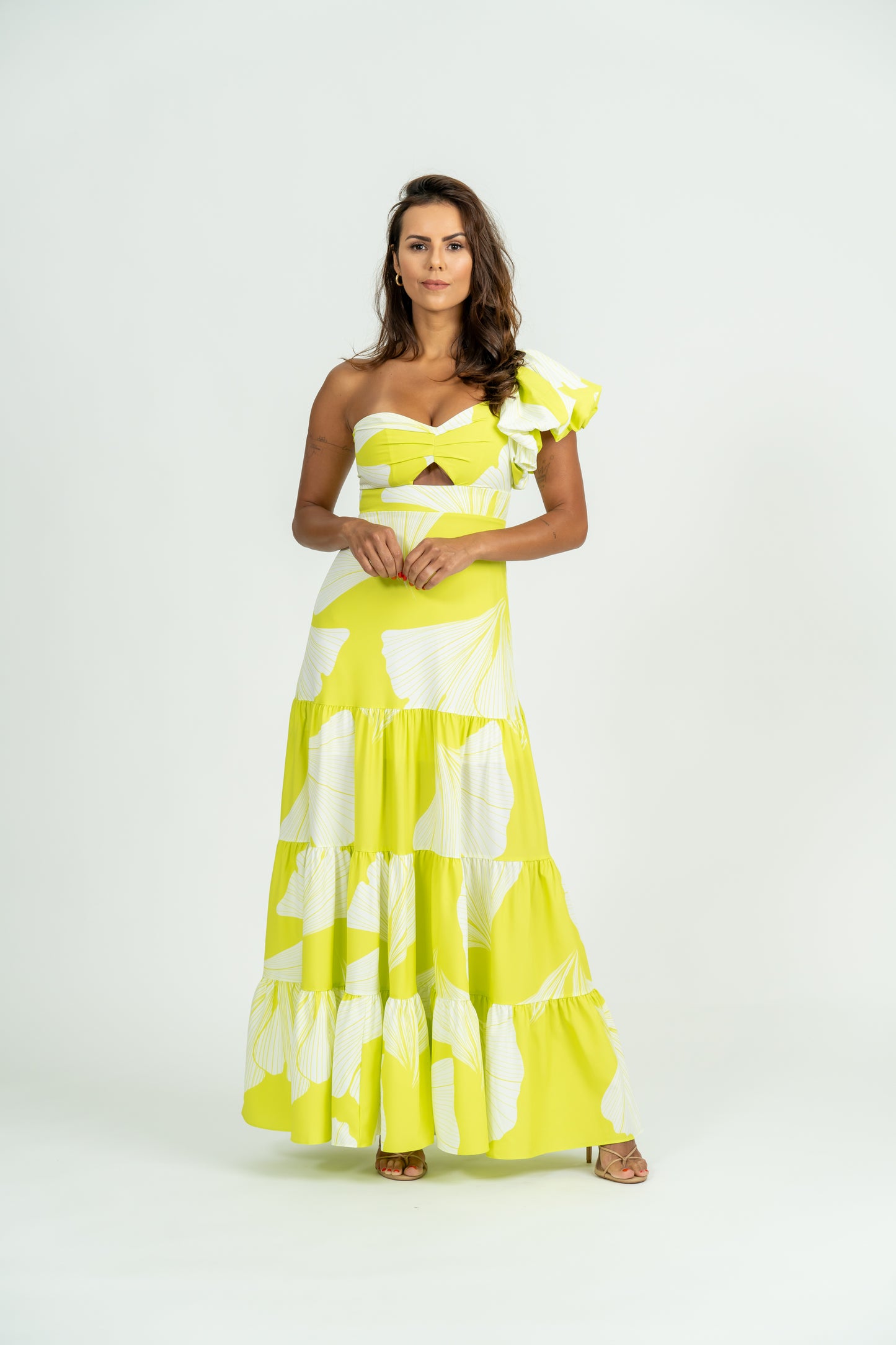 Load and play video in Gallery viewer, Video showcasing Sabalia Maxi Dress with one-shoulder puff sleeve and tiered maxi skirt
